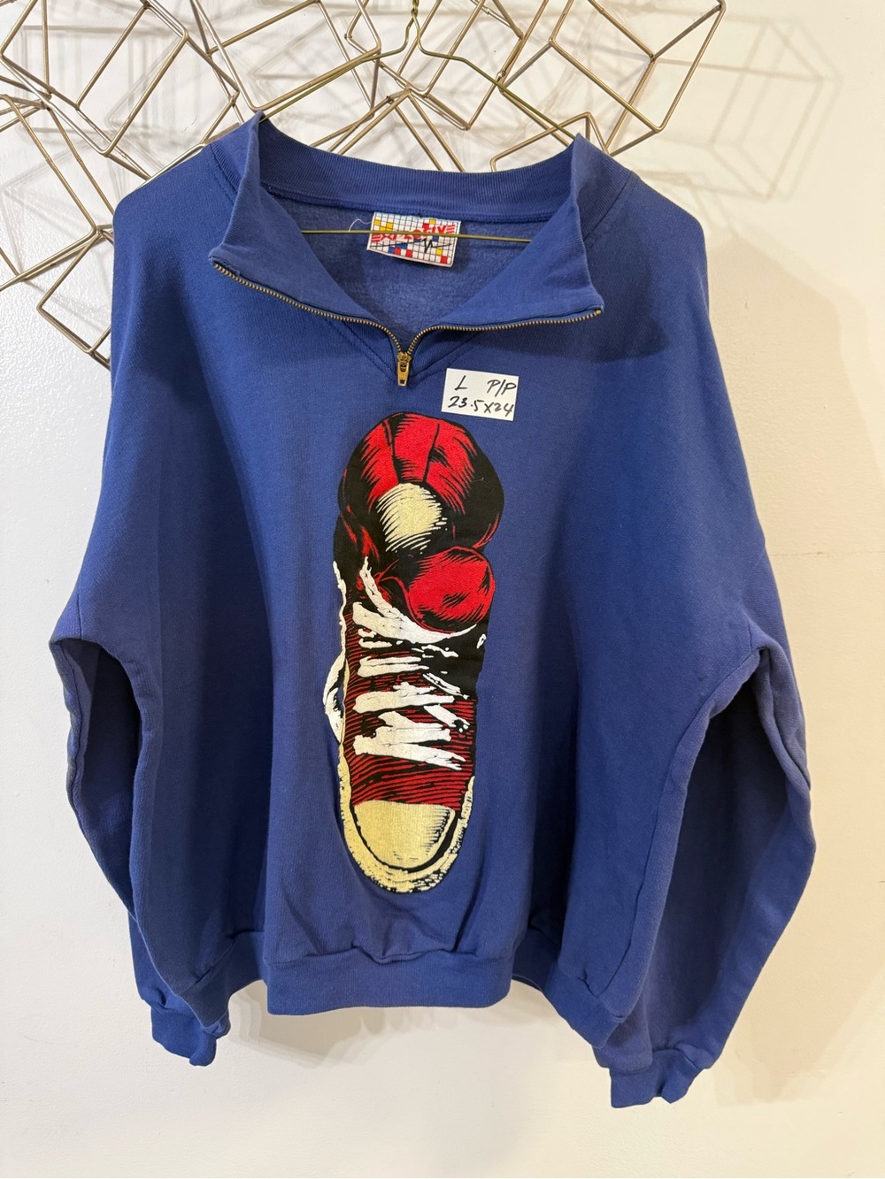 Vintage Style Blue Quarter-Zip Sweatshirt with Red Sneaker Graphic